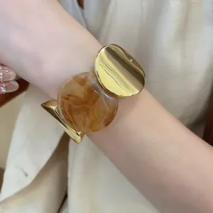 vintage acryl armband - goud en amberkleurig